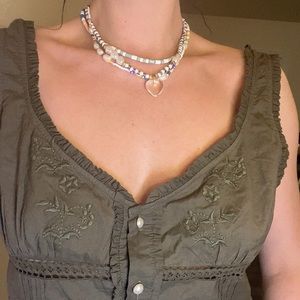 Free people too never worn it’s too loose for me either my small breasts